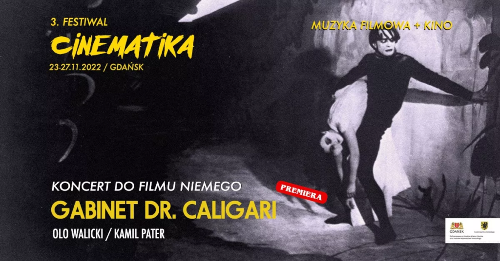kadr z czarno-białego filmu mężczyzna trzymający śpiącą kobietę